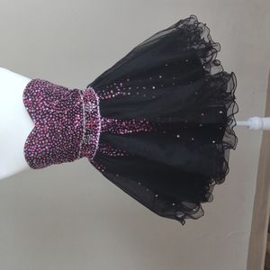 Valentine's Day Dress. Pink silver & red sequins. Black skirt. Size 4-6 No brand